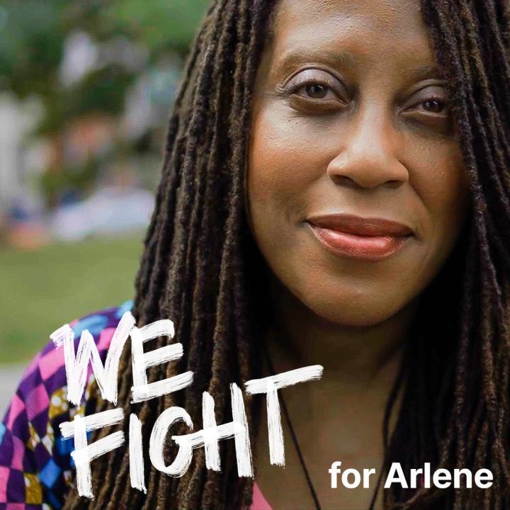 We fight for Arlene in white next to African American woman